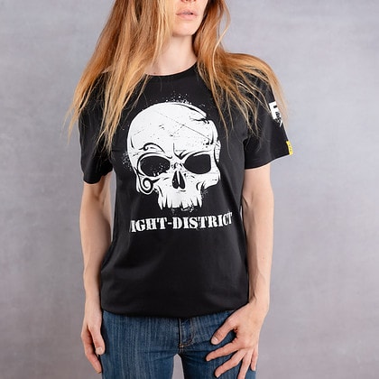 Front view of a woman wearing a black T-shirt with a white logo from the Cabal Skull collection.
