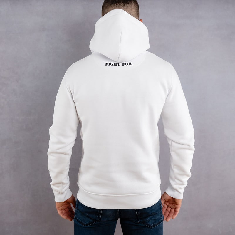 Image de dos d'un homme portant un hoodie blanc au logo noir de la collection The Original