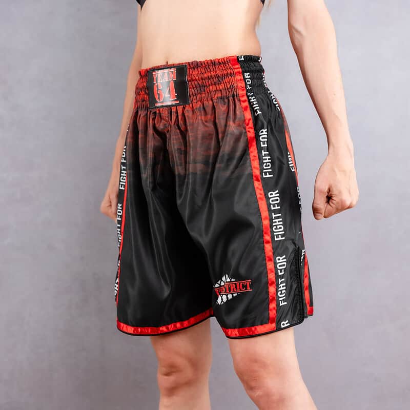 muay thai fight district front shorts worn by a woman